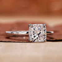 white gold engagement ring with hidden halo detail.