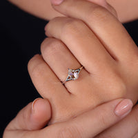 Split shank ring with white gold engagement ring.
