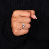 Custom engagement ring featuring pear diamond