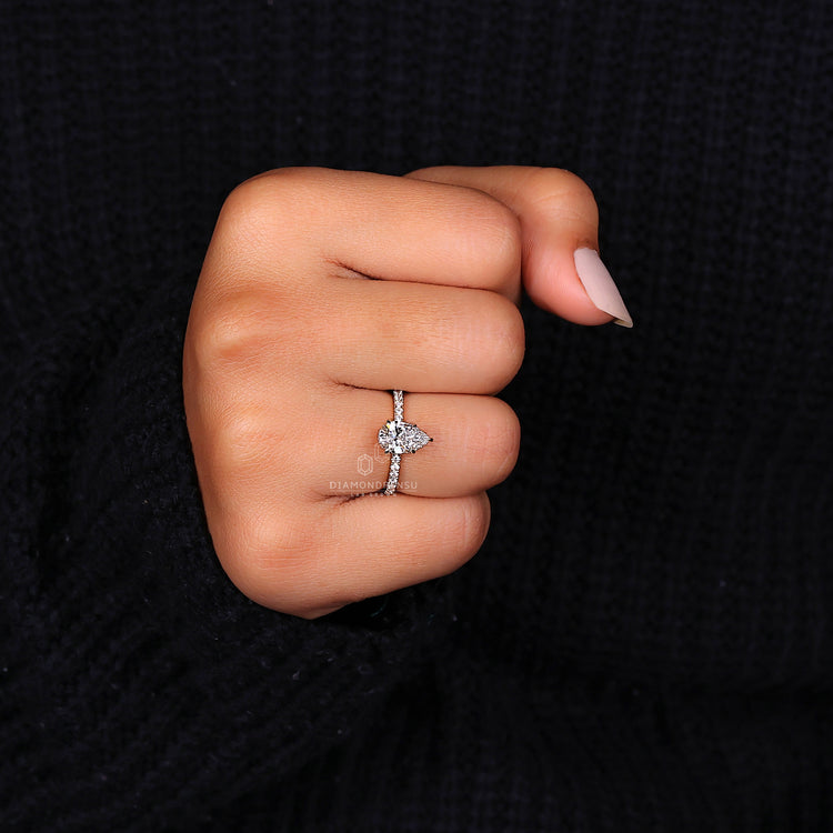Custom engagement ring featuring pear diamond