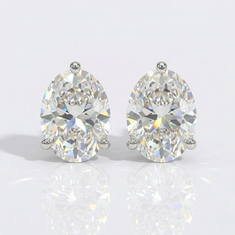 4 TCW Oval Cut Martini Prong Moissanite Stud Earrings - 14k White Gold