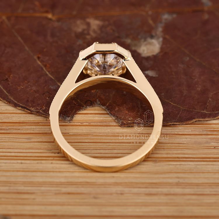 Handmade Octagon Old European Cut three stone diamond ring.