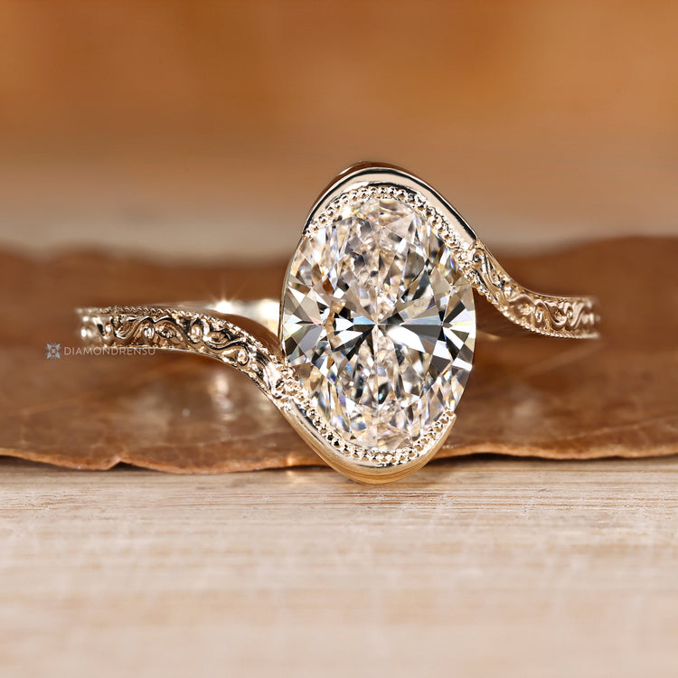 Handmade oval diamond ring with solitaire style.