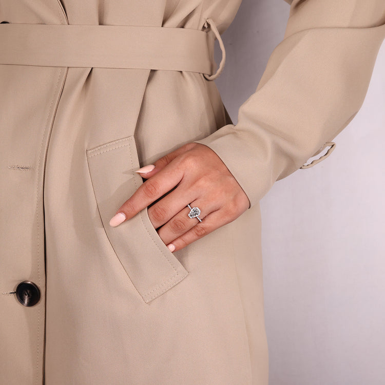 Coffin cut diamond ring four prong halo pave style.