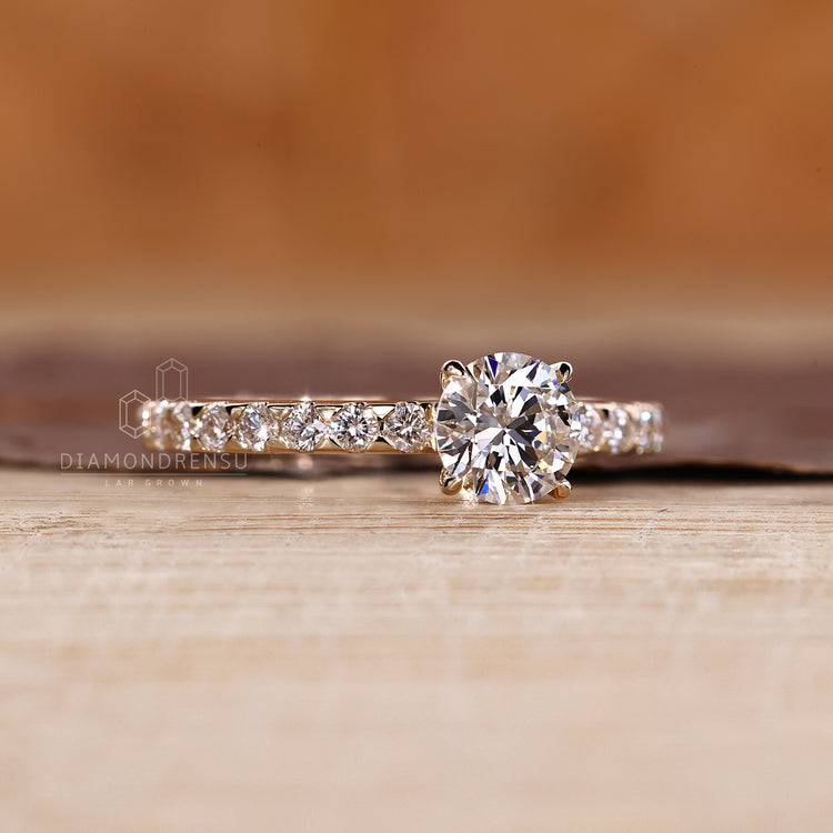 Elegant round diamond ring available in 0.50 to 2 CT.