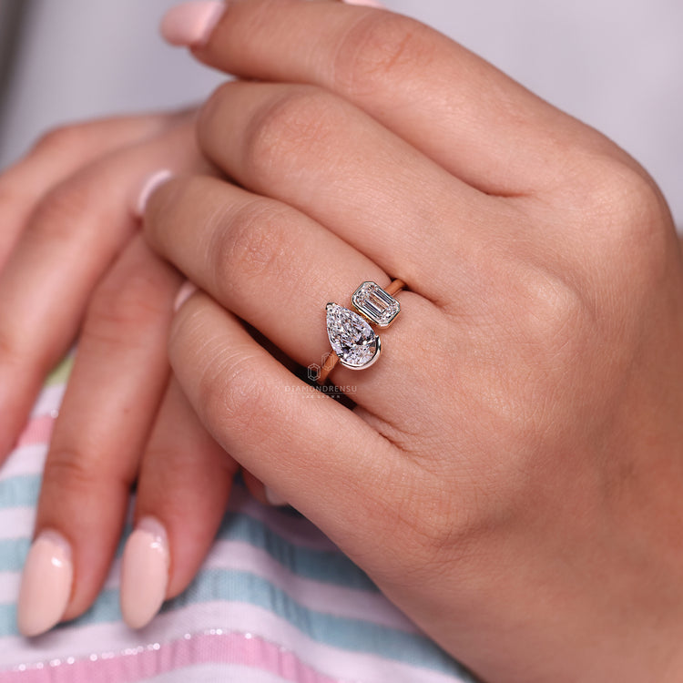 Toi et moi ring bezel v prong cathedral setting.
