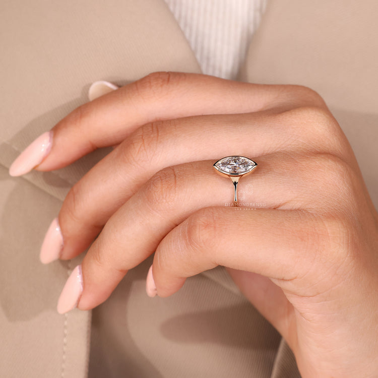 Handmade marquise diamond ring solitaire pinch shank.
