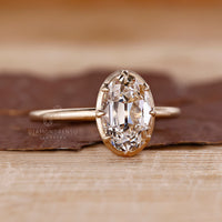 IGI certified old mine oval cut diamond ring.