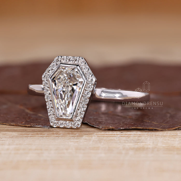 Lab grown coffin diamond ring halo style.