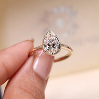 Pear cut ring eight claw prong bezel style vintage.