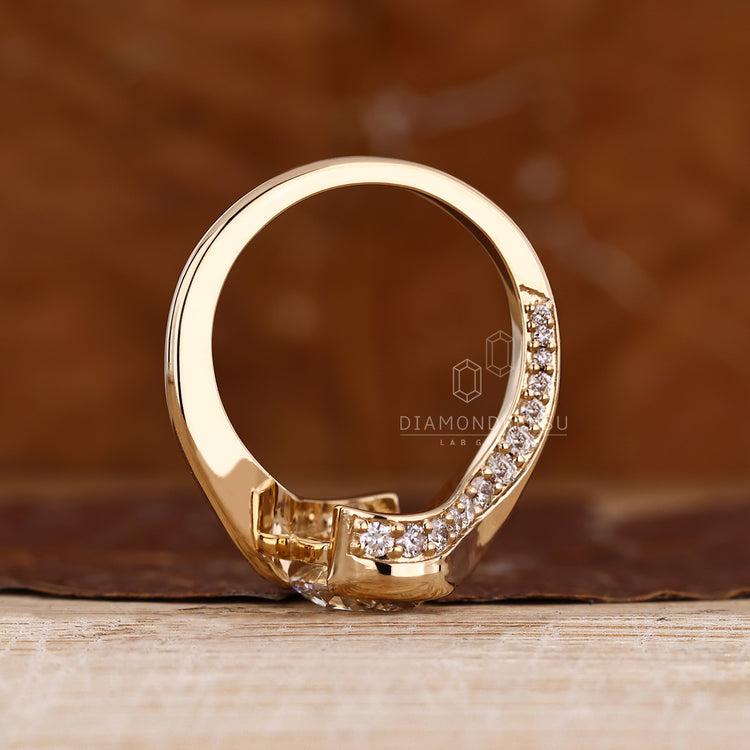 IGI certified oval diamond ring half bezel set.