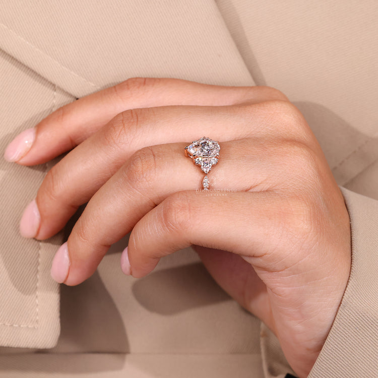 Pear cut diamond ring five claw prong vintage style.