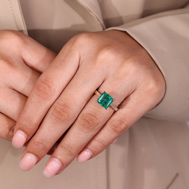 Asscher cut ring tapered shank milgrain prong style.