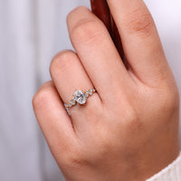 Oval cut ring vintage cluster six claw prong setting.