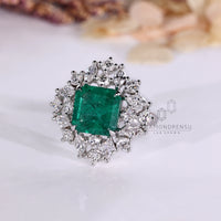 Handmade Asscher emerald ring twisted shank cluster.