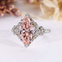 Vintage marquise cut diamond ring with pink diamond.