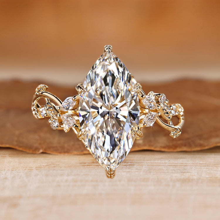 Marquise diamond ring with marquise and round side stones.
