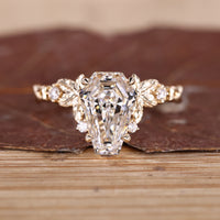 Coffin cut diamond ring five stone nature style.