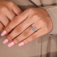 Marquise diamond ring twisted pave solitaire style.