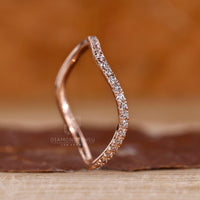 Round cut band ocean wave half eternity design.