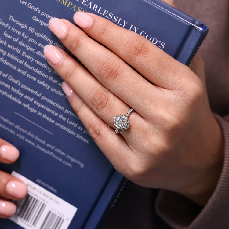 Lab grown elongated cushion cut diamond ring in cathedral setting.