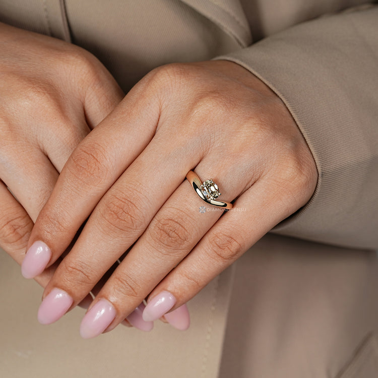 Old mine cushion diamond ring with tapered band.