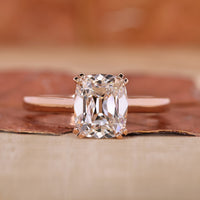 Cushion old European cut ring cathedral double prong.