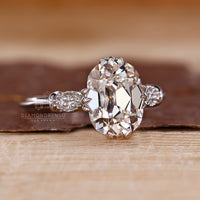 Handmade Cushion Old European Cut seven stone ring.