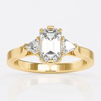 Three Stone Emerald Cut Ring With Trillion Side Stones