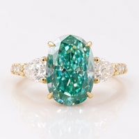 5.21 TW Oval Cut Twisted Shank Three Stones Moissanite Engagement Ring