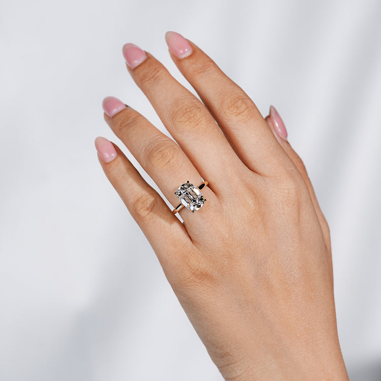 Cushion old mine diamond ring with four claw setting.