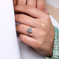 Lab grown oval cut diamond ring with tapered shank.