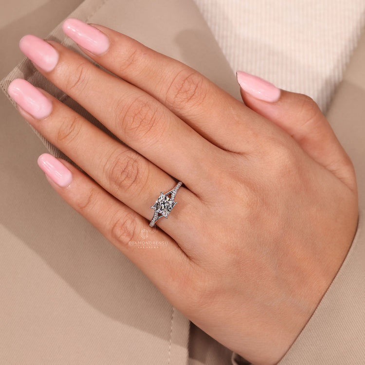 Princess cut diamond ring four prong cathedral style.