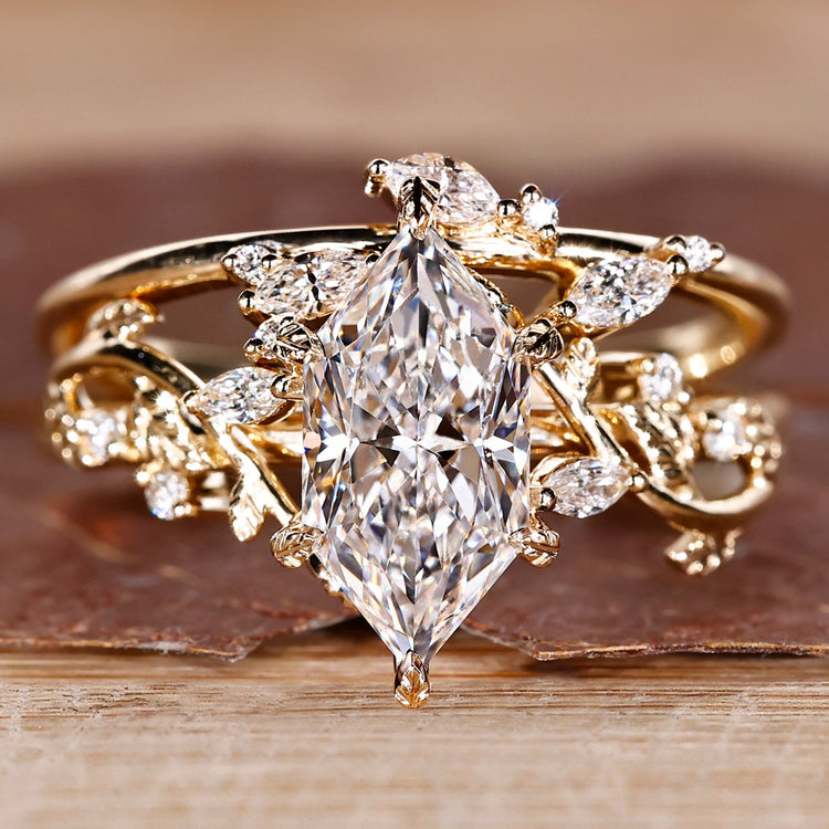 Dutch marquise diamond bridal set with leaf prongs.