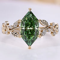 Dutch marquise diamond ring with green diamond.
