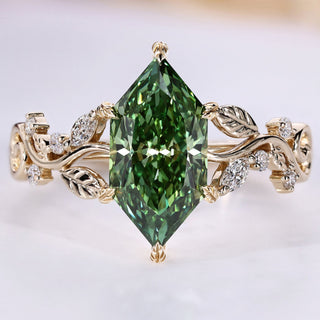 Dutch marquise diamond ring with green diamond.