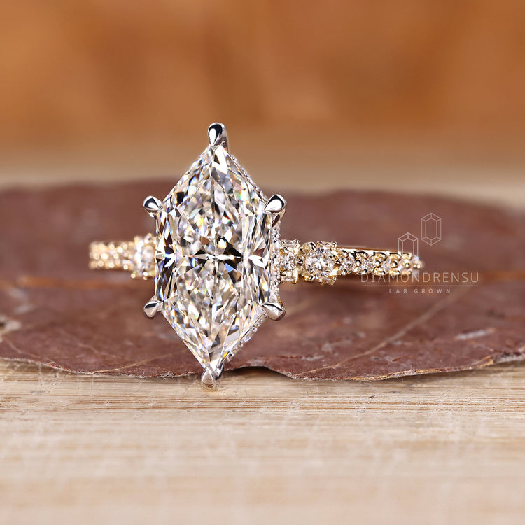 Dutch marquise ring pave round diamond hidden halo.
