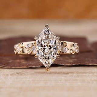 Dutch marquise ring with marquise side stone.