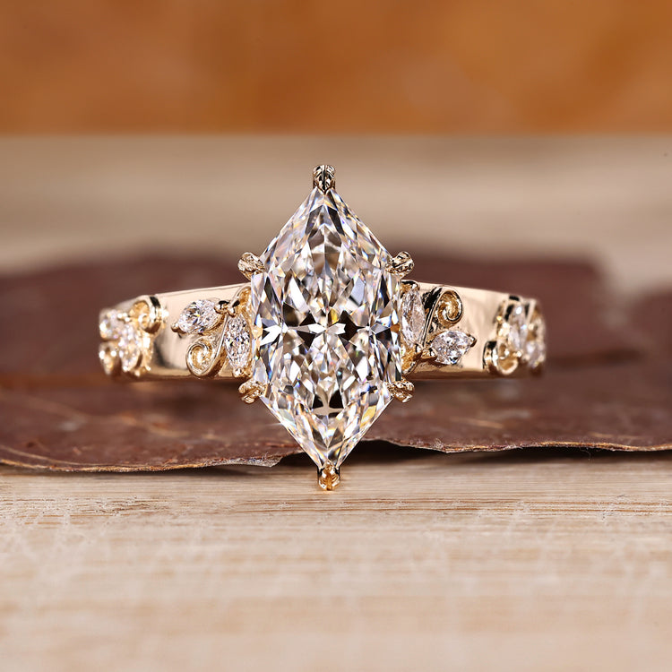 Dutch marquise ring with marquise side stone.