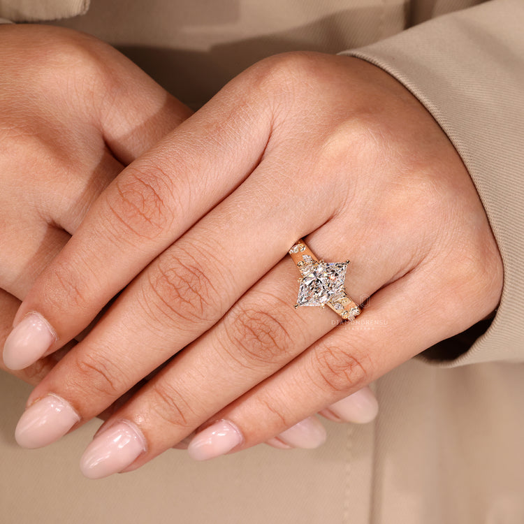 Marquise side stone diamond ring design.
