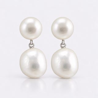 White semi-baroque freshwater pearl hanging from button pearl stud earrings