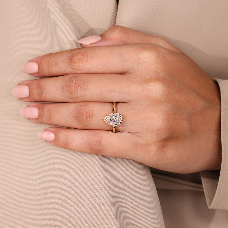 Pear cut diamond ring IGI certified vintage style.