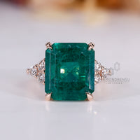 Emerald gemstone ring seven stone muse tapered shank.