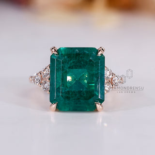 Emerald gemstone ring seven stone muse tapered shank.