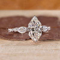 IGI certified Dutch marquise three stone diamond ring.