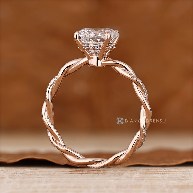 Handmade Portuguese diamond ring with four prongs.