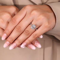 Cushion cut diamond ring four prong hidden halo.