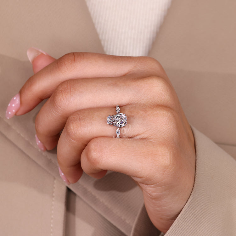 Coffin cut diamond ring pave band prong setting.