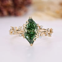 Dutch marquise diamond ring with nature inspired details.