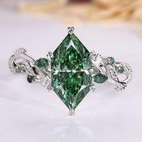 Handmade Dutch marquise diamond ring with green centre stone.